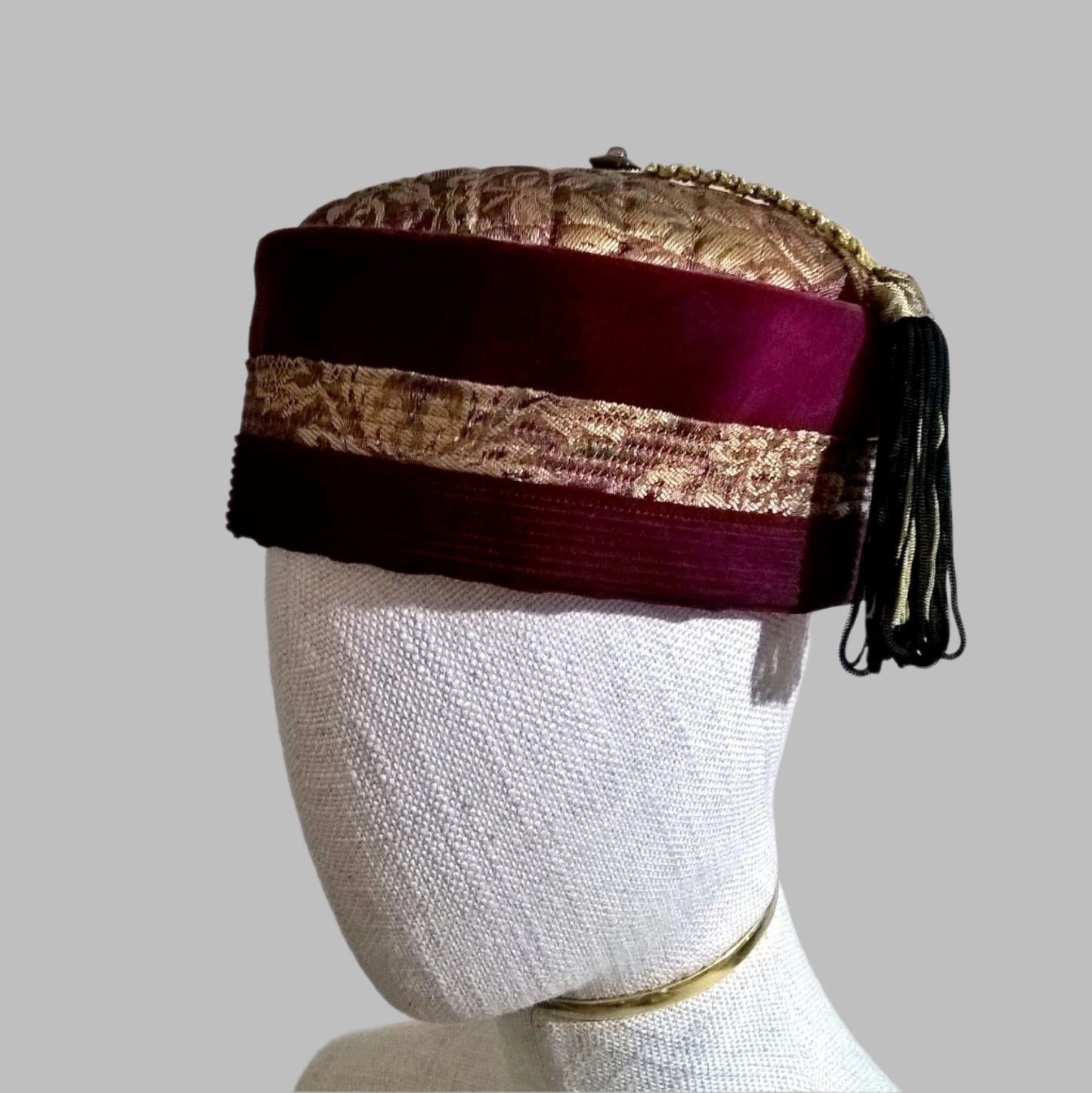 Handmade pillbox smoking cap with gold brocade quilted tip and red velvet and corduroy crown with gold brocade detail. Finished with a macrame gold and black tassel