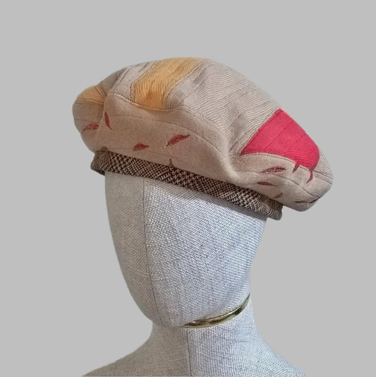 Patchwork Beret handmade from upcycled cashmere in fawn, red and yellow with leaf embroidery and contrasting check wool band