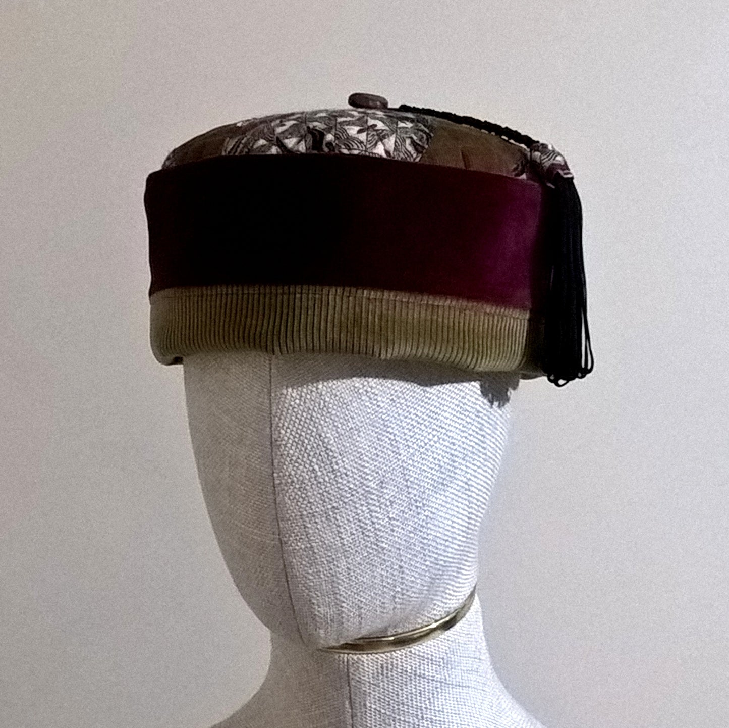 Velvet, corduroy and paisley pillbox shaped smoking cap with macrame tassel