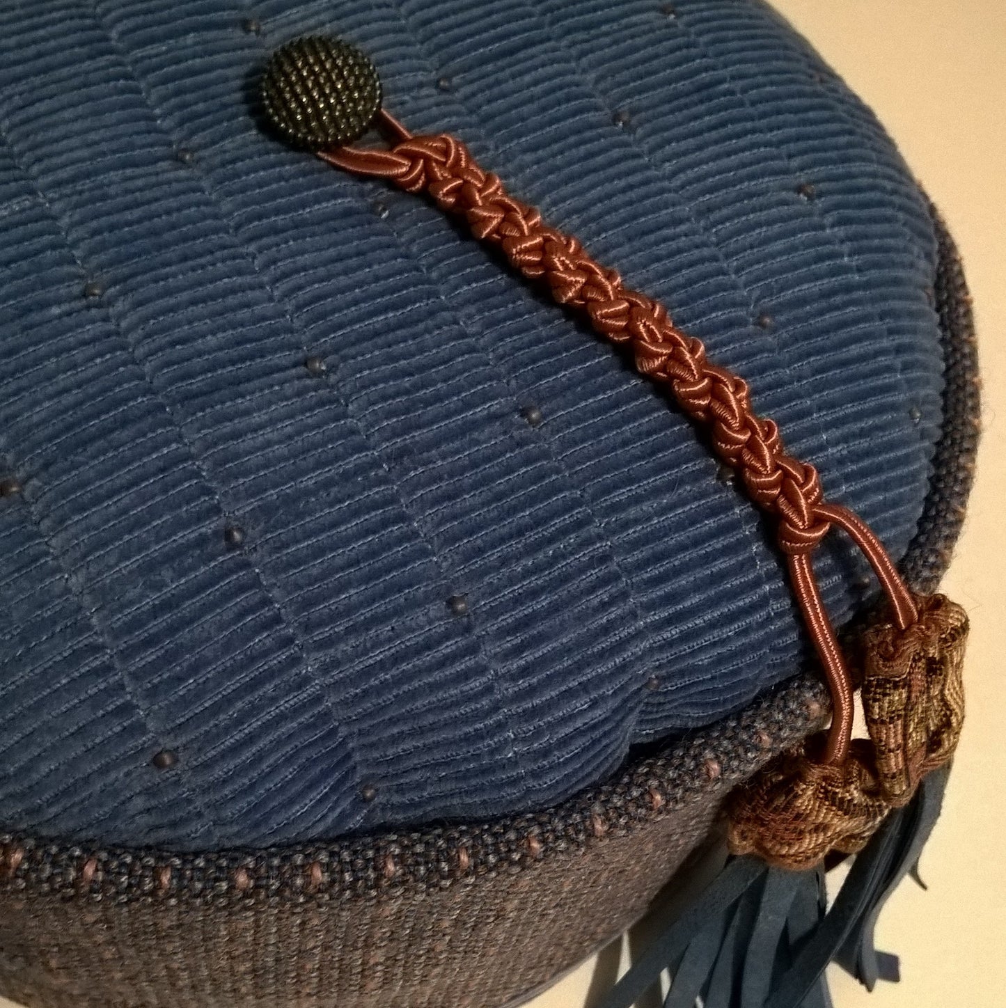 Vintage button and macrame tassel on tip of smoking cap