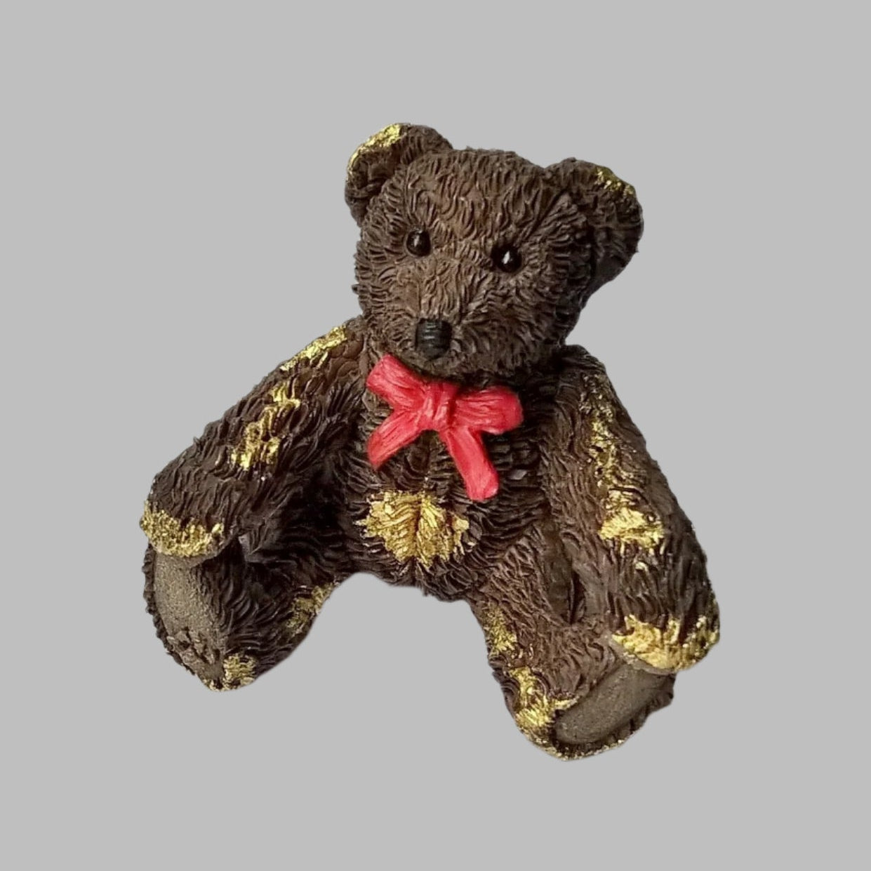 Vintage miniature ceramic brown bear from 1995 with bright red bow and hand gilded with pure 24ct gold to make it a unique one-off.  