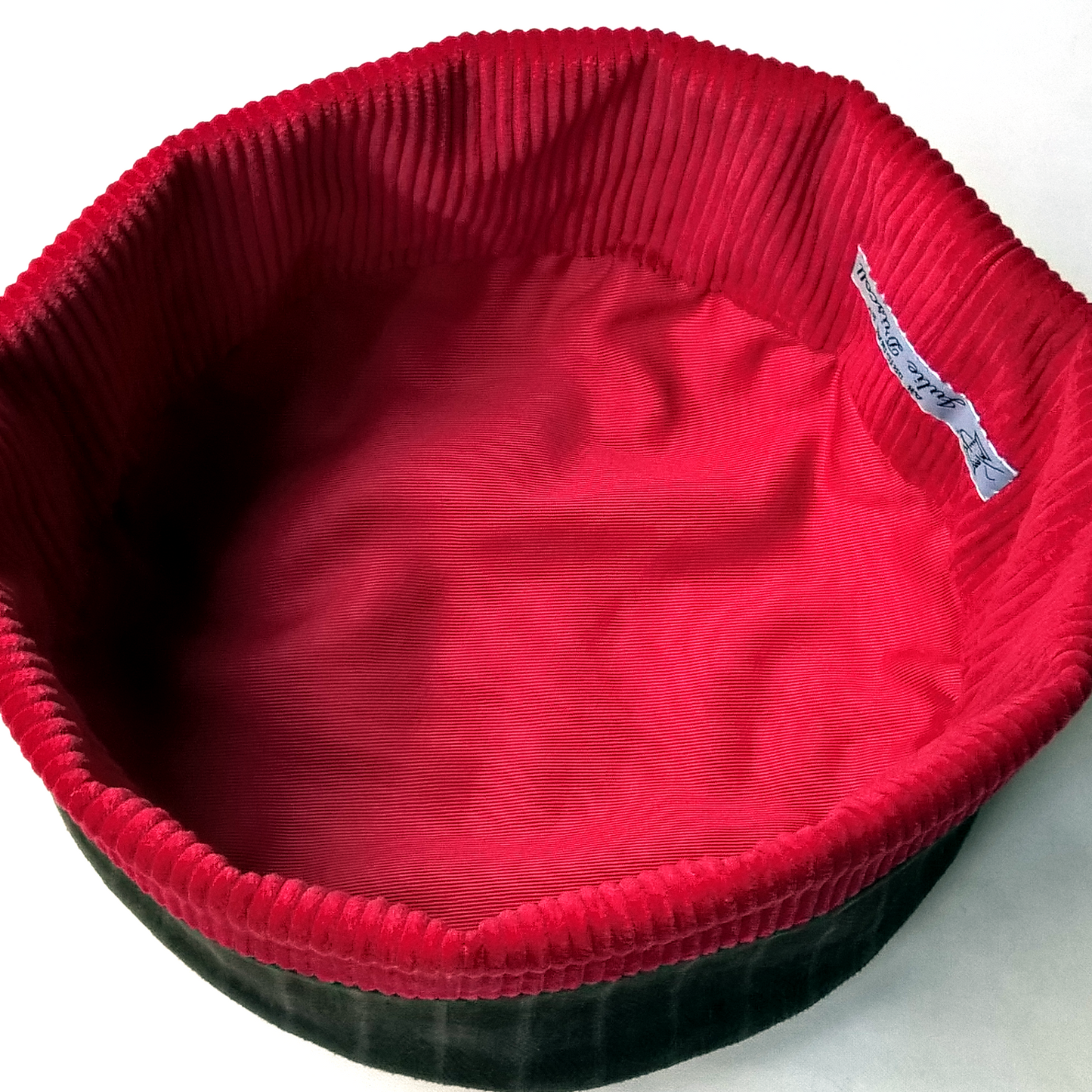 Red inner lining of smoking cap