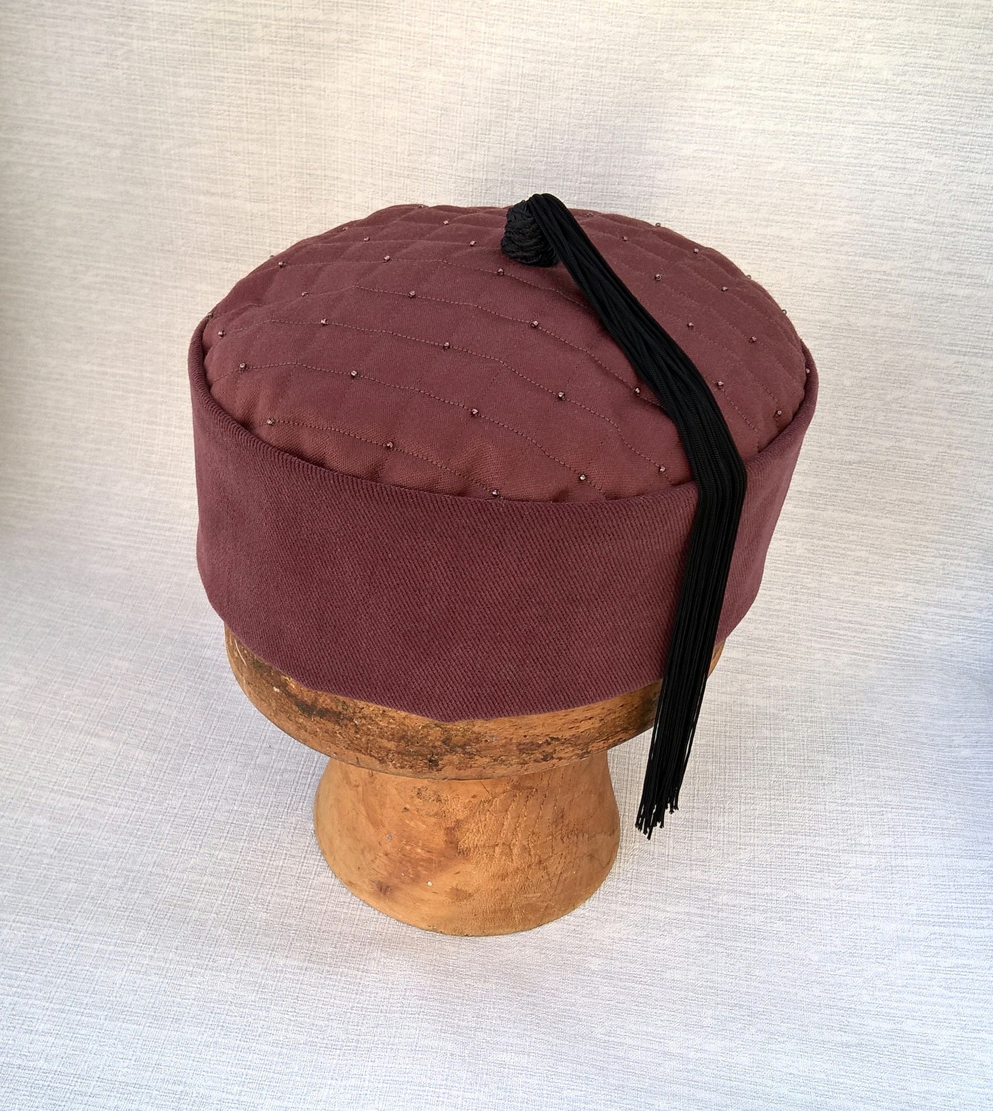 Handmade smoking cap with quilted tip and black tassel