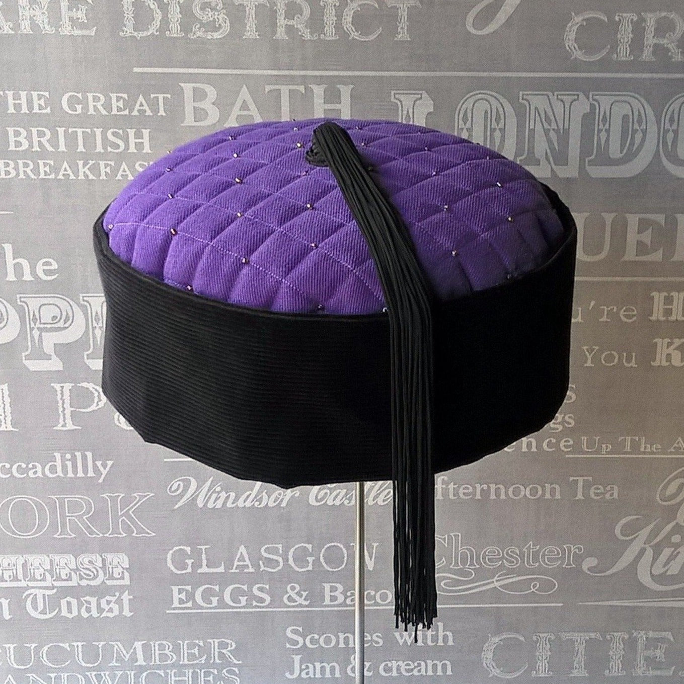 Purple and black tassel smoking cap with multi coloured beading by TwiLd Capit Hog