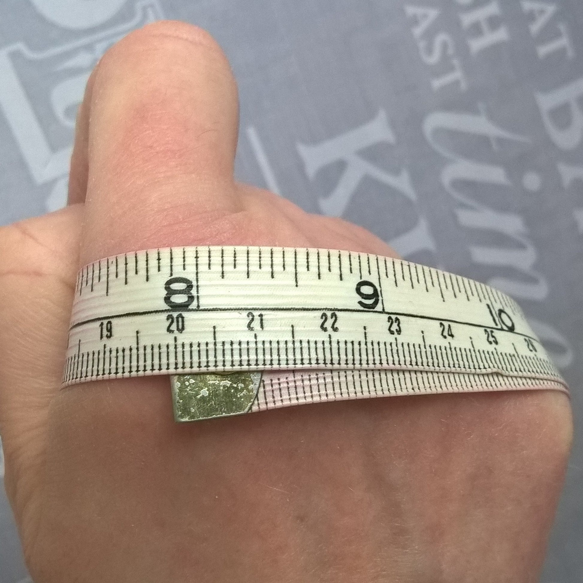 Measure around knuckles to determine size.