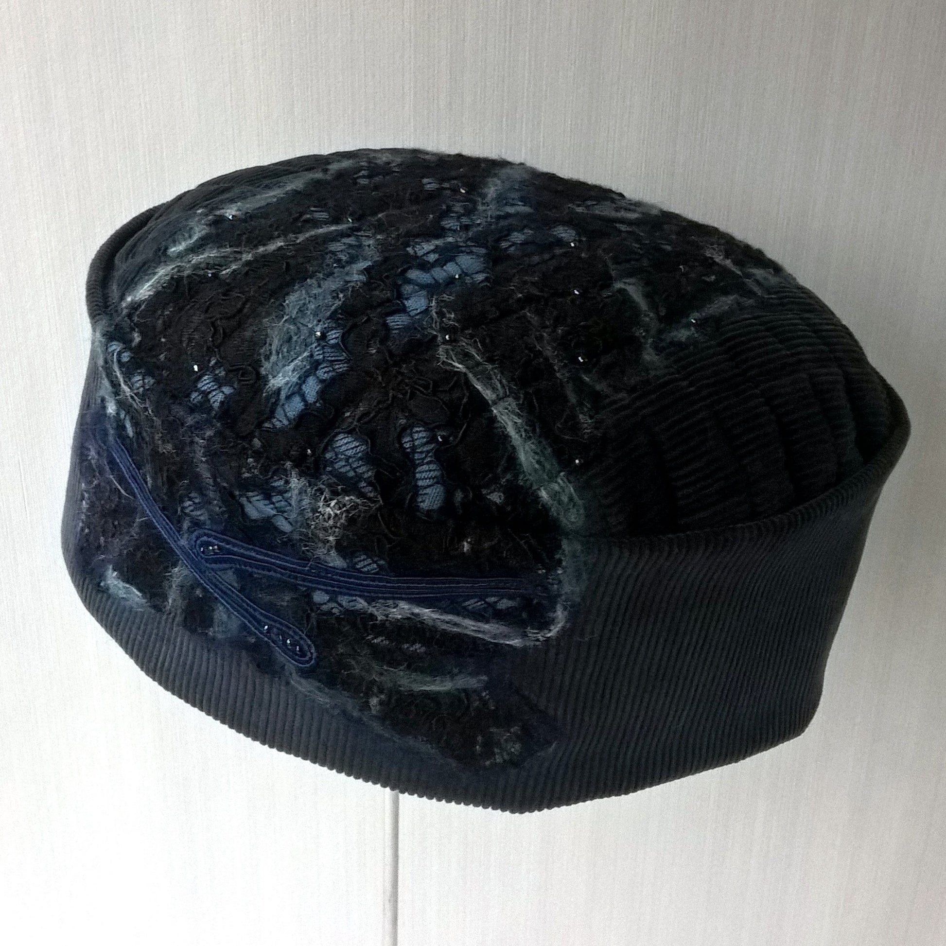 Blue corduroy smoking cap with nuno felting detail to tip and crown