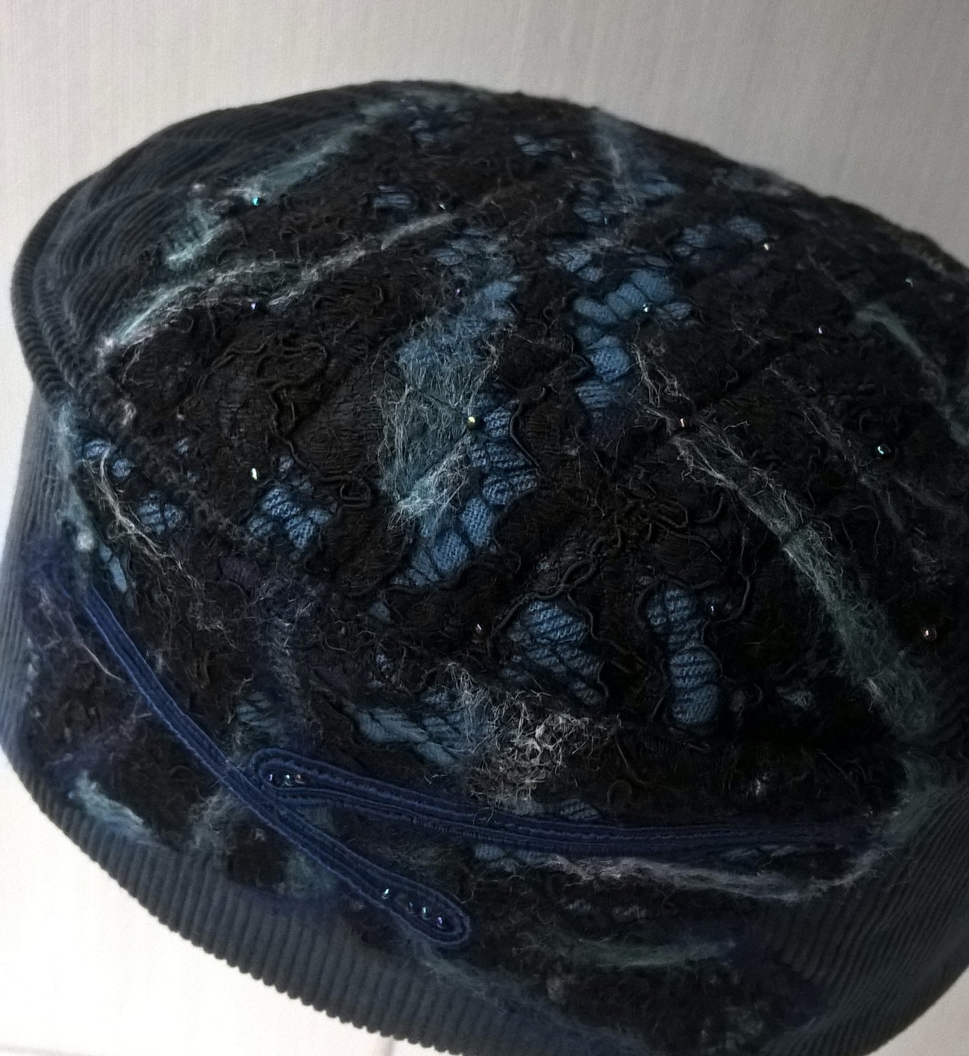 Blue corduroy smoking cap with nuno felting detail to tip and crown