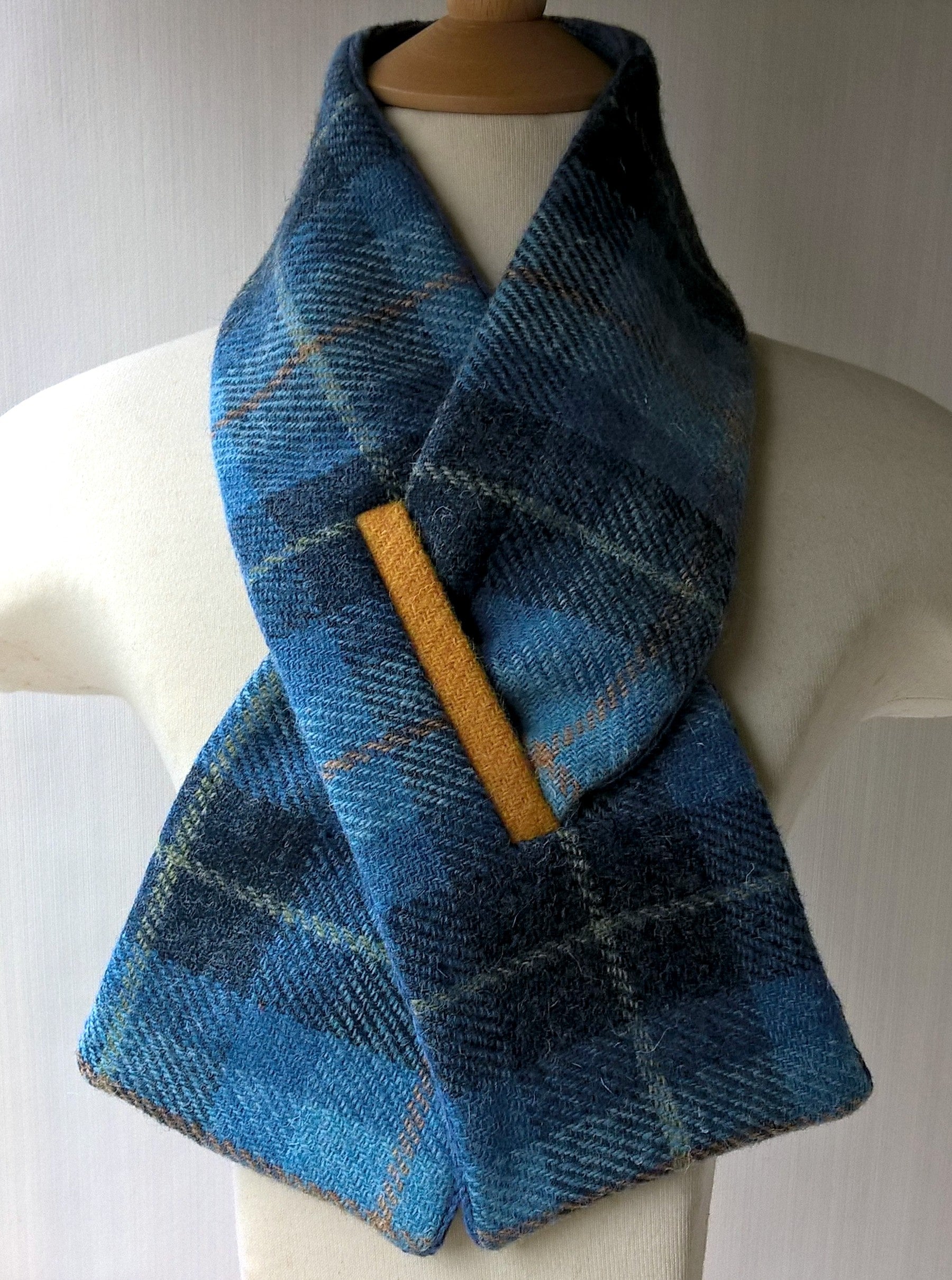 Harris tweed wool scarf in blue and yellow check  with keyhole closure