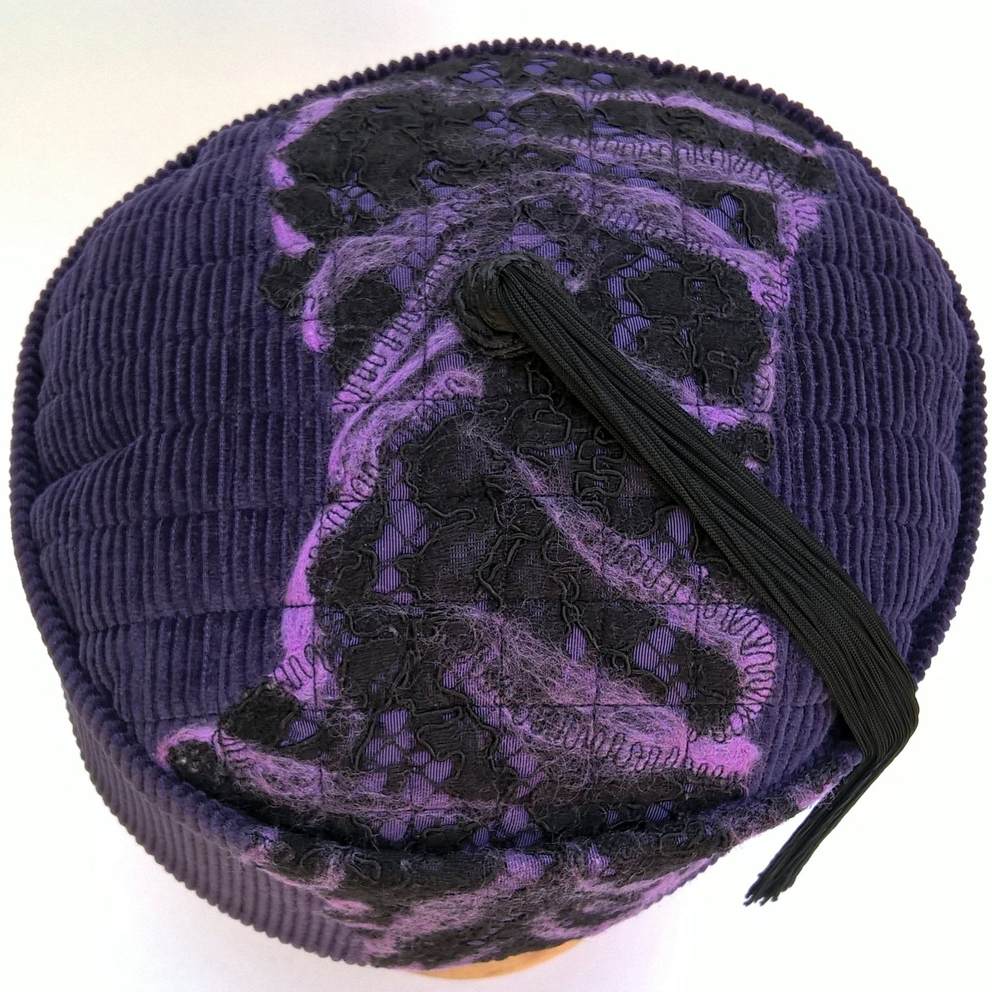 Tip of purple corduroy smoking cap with nuno felting