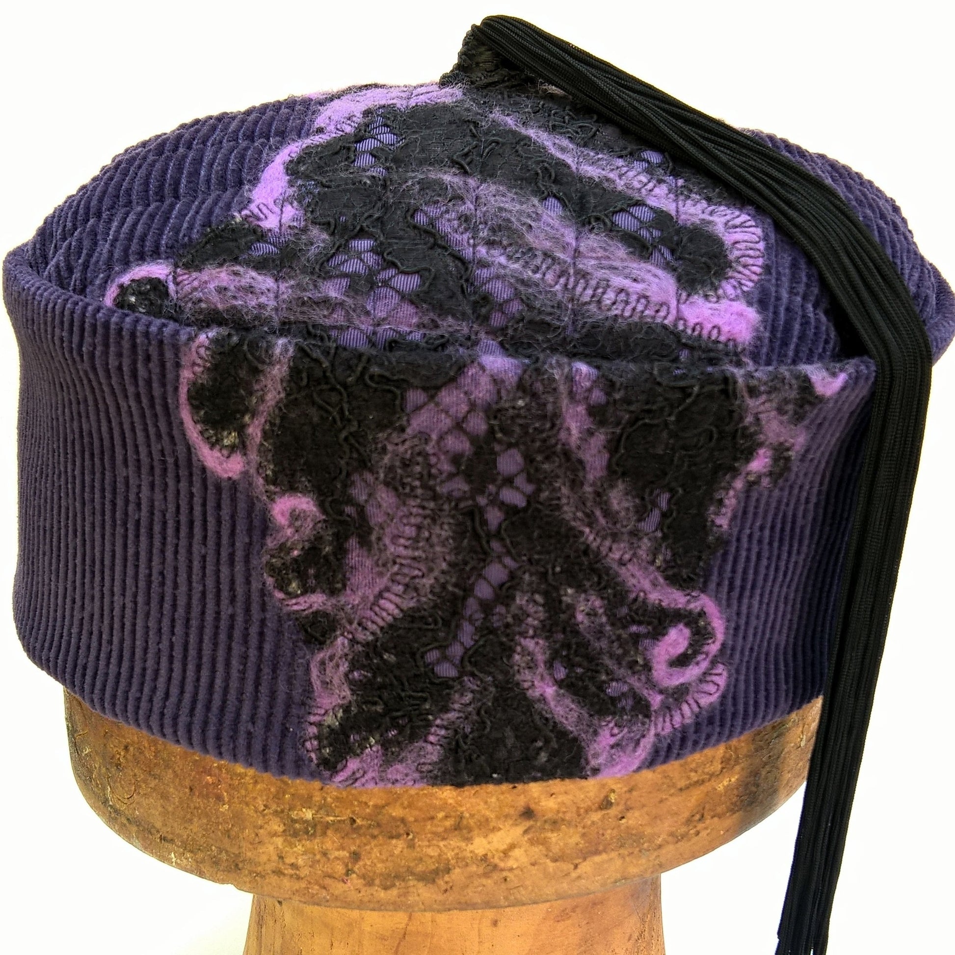 Black lace and felted detail on smoking cap  with fixed tassel
